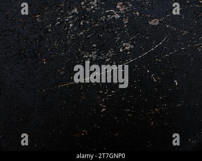 scratched black wall texture, black grunge background. Stock Photo