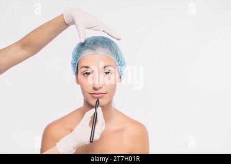 Pretty woman preparing injection by doctor Stock Photo