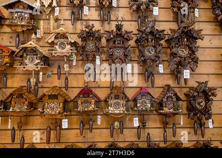 Cuckoo clocks on the shop wall, Triberg in the Black Forest, Baden-Wuerttemberg, Germany Stock Photo