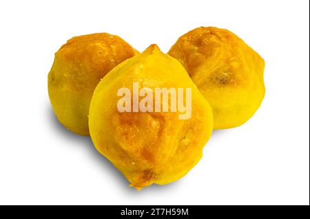 Delicious homemade mini pineapple  pies isolated on white background with clipping path. Stock Photo