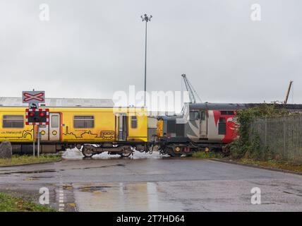 Rail Operations Group class 37 locomotive shunting scrap Merseyrail class 507 train into SIMS Metals, Newport, south Wales for breaking Stock Photo