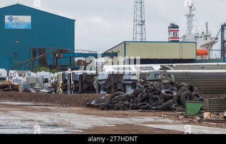 Scrap class 321 electric multiple unit trains waiting to be broken up and recycled at SIMS metals, Newport docks, South Wales, UK Stock Photo