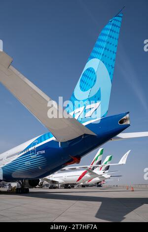 A Boeing 777 infront of an Airbus A380 from Emirates Airline, on display at the Dubai Airshow 2023, United Arab Emirates Stock Photo