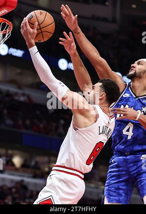 Chicago, U.S. state of Illinois. 15th Nov, 2023. Chicago Bulls' Zach LaVine (L) drives to the basket during NBA regular season game between the Orlando Magic and the Chicago Bulls at United Center in Chicago, U.S. state of Illinois, on Nov. 15, 2023. Credit: Joel Lerner/Xinhua/Alamy Live News Stock Photo