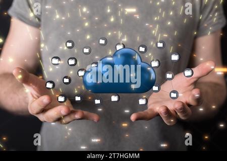 The hand holding a cloud with linked folders. Server, internet infrastructure concept Stock Photo