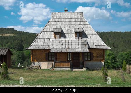 traditional wooden house in Kustendorf-Drvengrad serbian village in mountain of Mokra Gora, Serbia Stock Photo