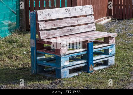 A garden seat made from recycled pallets. Stock Photo