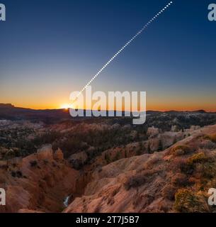 This is a portrait of the October 14, 2023 annular eclipse of the Sun, captured in a sequence of images taken from the rim of Bryce Canyon, Utah, from Stock Photo