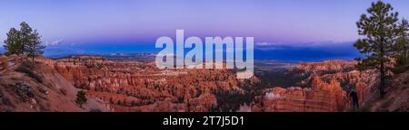 This is a panorama of the evening sky looking east at sunset from Sunset Point at Bryce Canyon National Park, Utah.  The sky contains the dark blue sh Stock Photo
