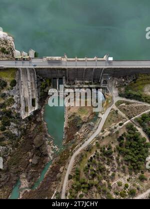 Wall of a gravity dam from above dedicated to irrigation and water containment and spillway channel in Bellus, in the province of Valencia, Spain. Civ Stock Photo