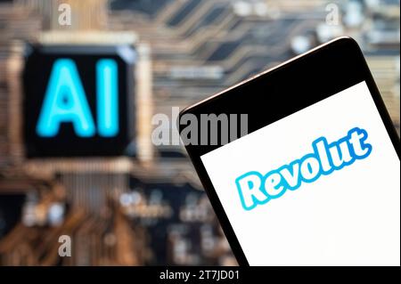 China. 03rd Nov, 2023. In this photo illustration, the British digital banking includes a pre-paid debit card (MasterCard or VISA), currency exchange, cryptocurrency exchange (Bitcoin) Revolut logo seen displayed on a smartphone with an Artificial intelligence (AI) chip and symbol in the background. Credit: SOPA Images Limited/Alamy Live News Stock Photo