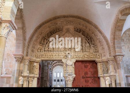Vezelay, FRANCE - July 20, 2023: Portal tympanum and entryway of historic St. Mary Magdalene basilica on UNESCO list of World Heritage Sites. Stock Photo