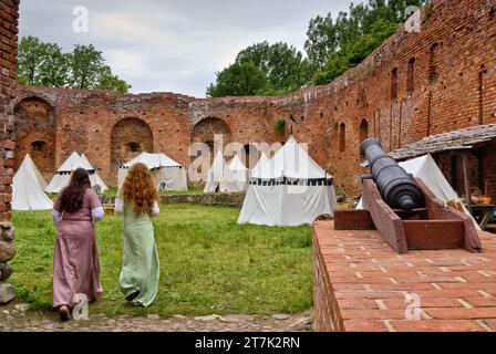 Historic reenactment at courtyard of medieval castle at Międzyrzecz, Lubuskie Voivodeship,  Poland Stock Photo