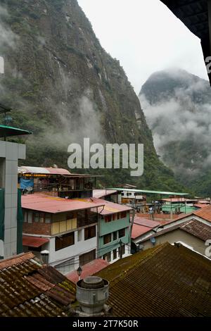 Machu Picchu, Peru, October 6, 2023. Machu Picchu town in the valley surrounded by mist covered mountains. Stock Photo