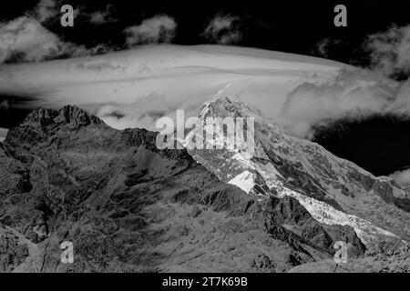 Clouds, Nevado Chopicalqui, Cordillera Blanca, Ancash, Peru Stock Photo