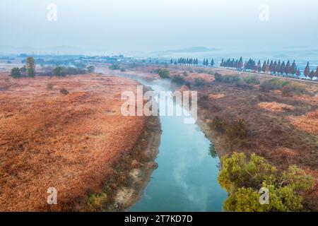 An aerial view of autumn along the river Stock Photo