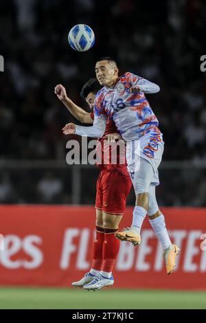 Manila, Philippine. 16th Nov, 2023. Phan Tuan Tai (L) of Vietnam competes against Patrick Reichelt of the Philippines during the 2026 World Cup qualifying match between the Philippines and Vietnam in Manila, the Philippine, on Nov. 16, 2023. Credit: Rouelle Umali/Xinhua/Alamy Live News Stock Photo