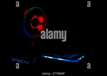 Moscow, Russia - November 30, 2021: gaming computer GeForce RTX 3060TI graphics processing by Nvidia. AMD cooling cooler with backlight. Cryptocurrenc Stock Photo