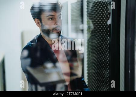 Multiracial Business Team Collaborating on Strategic Planning and Market Analysis in Corporate Office Stock Photo