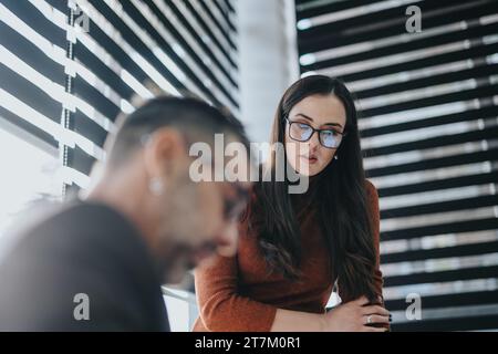 Multigenerational Business Group Collaborating on Strategic Planning and Market Analysis in Corporate Office Stock Photo