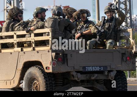 Ashkelon, Israel. 16th Nov, 2023. Israeli soldiers seen in in a jovial mood as they ride in a Humvee in Ashkelon, southern Israel, on way to the front lines inside the Gaza Strip on November 16, 2023. Despite the UN Security Council calling for a ceasefire Israel continues its war on Hamas inside the Gaza Strip as it demands the return of over 200 hostages taken during the Hamas infiltrations on October 7, 2023. Two Israeli solders were killed in Gaza fighting in the last day, Israel reported. Photo by Jim Hollander/UPI Credit: UPI/Alamy Live News Stock Photo