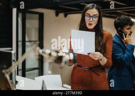 Businesspeople analyzing reports, discussing strategies, and targeting specific groups for successful sales strategies and business growth. Stock Photo