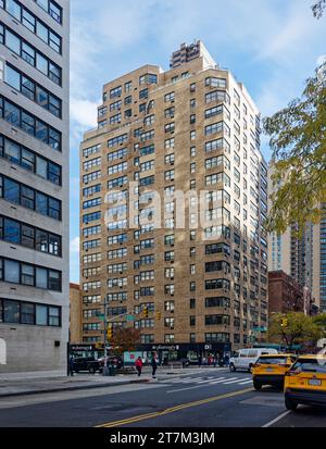 399 East 72nd Street, a brick apartment building with stores designed ...
