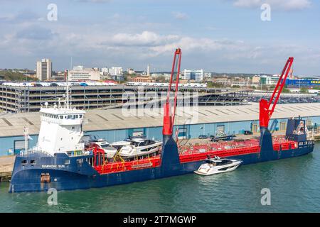 FWN Sun General Cargo Ship unloading power boats at Port of Southampton , Southampton, Hampshire, England, United Kingdom Stock Photo