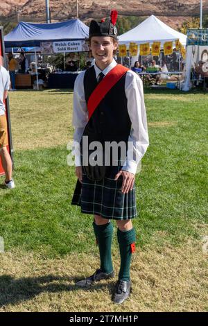 A young man in a traditional Scottish kilt at the Scots on the Rocks Celtic Festival in Moab, Utah. Stock Photo