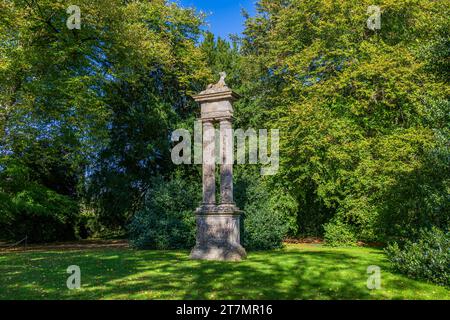 A stone sphinx by Benjamin Carter on two fluted columns at Lacock Abbey, Wiltshire, England, UK Stock Photo