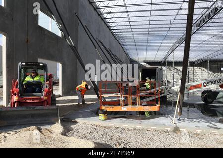 The interior of a concrete tilt up warehouse under construction. Stock Photo