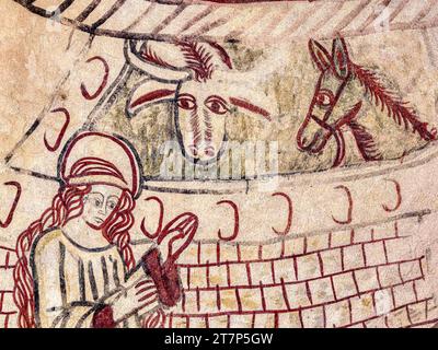 A medieval line drawing depicting Virgin Mary in the stable with an ox and donkey, a medieval wall-painting in Sanderum Church, Denmark, January 15, 2 Stock Photo