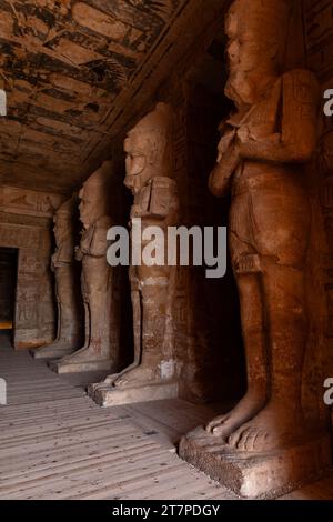 Large interior statues and hieroglyphics of Abu Simbel temple ancient historical UNESCO heritage site build by King Ramses II Stock Photo