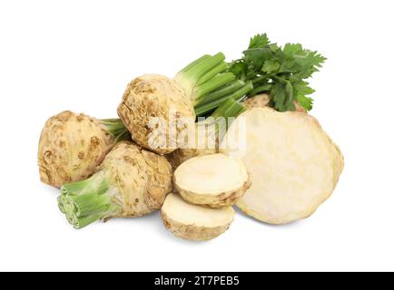 Whole and cut celery roots isolated on white Stock Photo