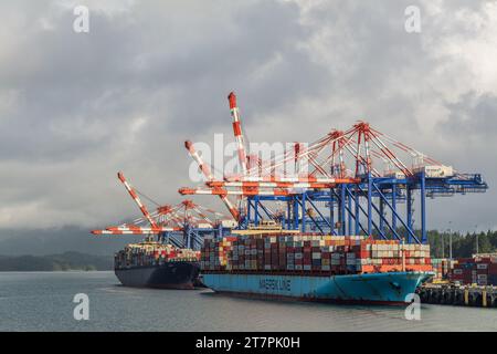 Container ship in import export business logistics. By crane ,Trade Port , Shipping, cargo to harbor, Stock Photo