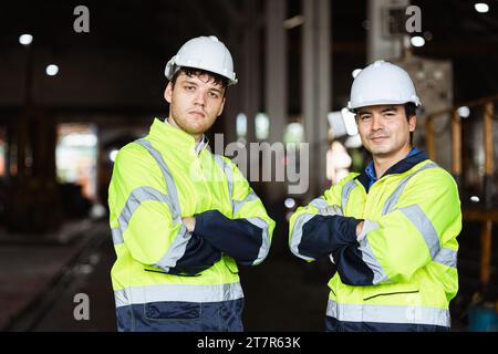 Portrait professional engineer machine service team smart and confident standingarm folded  together, Workers in heavy industry. Stock Photo