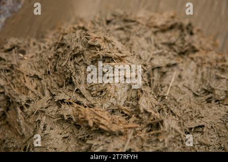Mixture of straw and mud for the reconstruction of an old Japanese house. Stock Photo