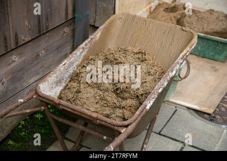 Mixture of straw and mud for the reconstruction of an old Japanese house. Stock Photo
