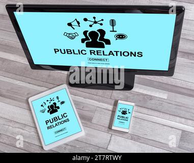 Public relations concept shown on different information technology devices Stock Photo