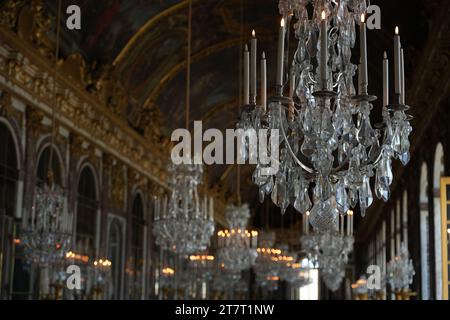 Versailles, France, 29.07.2023: Chandelier in mirror room of Versailles Stock Photo