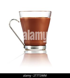 Hot chocolate in a heat-resistant glass with steel handle on a reflective white surface. Authentic studio shot. Stock Photo