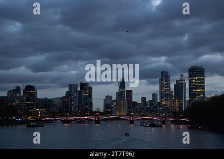 A moody sky with formations of dark clouds sits above the skyline over tower blocks and skyscrapers in Vauxhall and Nine Elms area, central London, UK Stock Photo