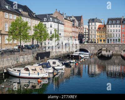 Canal under the Strombroen (Storm Bridge) with colourful houses in the old town, Copenhagen, Denmark, Scandinavia, Europe Stock Photo