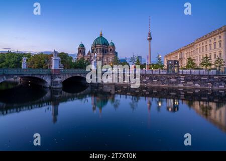 View of Berliner Dom, Berliner Fernsehturm reflecting in River Spree at dusk, Berlin, Germany, Europe Stock Photo