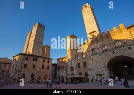 View of historic centre and towers in Piazza del Duomo, San Gimignano, UNESCO World Heritage Site, Province of Siena, Tuscany, Italy, Europe Stock Photo