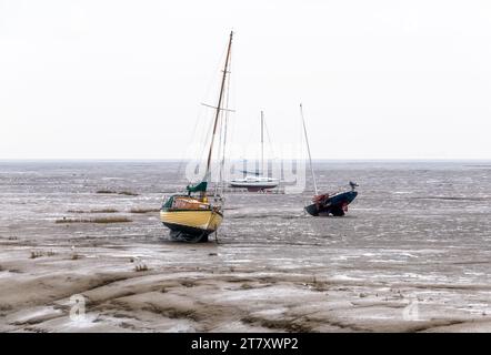Beached boats at the low tide at Leigh on Sea, Essex, England, United Kingdom, Europe Stock Photo