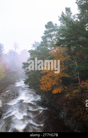 Clunie Water as it flows past the Fife Arms in the centre of Braemar.  ,Aberdeenshire, Scotland. Stock Photo