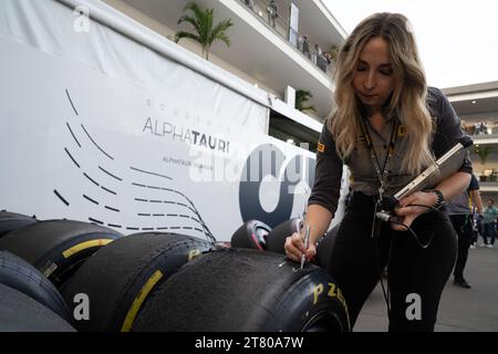 Pirelli’s engineers scrape down the tyres, marking each one by driver number and location of the tyre (front, rear, left or right) and collect data about the wear of the tyre that they then share with that team and the FIA, Mexican City Grand Prix, Mexico, 27 October 2023.  Each team is allocated one Pirelli engineer who can make suggestions based on the wear of the tyres.  Pirelli had one female track engineer at the Mexico City race, Mrs Monica Cuadrado, allocated to the Alpha Tauri team.    After the race in Qatar, the team noticed significant wear on one of the wheels, caused by pyramid cu Stock Photo