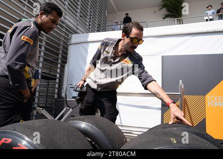 Pirelli’s engineers scrape down the tyres, marking each one by driver number and location of the tyre (front, rear, left or right) and collect data about the wear of the tyre that they then share with that team and the FIA, Mexican City Grand Prix, Mexico, 27 October 2023.  Each team is allocated one Pirelli engineer who can make suggestions based on the wear of the tyres.  Pirelli had one female track engineer at the Mexico City race, Mrs Monica Cuadrado, allocated to the Alpha Tauri team.    After the race in Qatar, the team noticed significant wear on one of the wheels, caused by pyramid cu Stock Photo