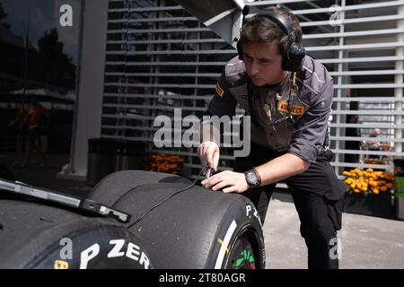 Pirelli’s engineers scrape down the tyres, marking each one by driver number and location of the tyre (front, rear, left or right) and collect data about the wear of the tyre that they then share with that team and the FIA, Mexican City Grand Prix, Mexico, 27 October 2023.  Each team is allocated one Pirelli engineer who can make suggestions based on the wear of the tyres.  Pirelli had one female track engineer at the Mexico City race, Mrs Monica Cuadrado, allocated to the Alpha Tauri team.    After the race in Qatar, the team noticed significant wear on one of the wheels, caused by pyramid cu Stock Photo